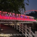 Die Brücken über den Singapore River sind abends beleuchtet